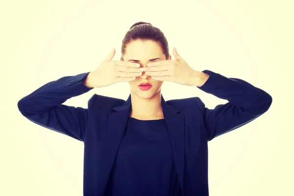 Beautiful woman covering her eyes — Stock Photo, Image