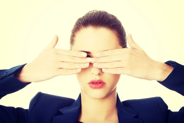 Beautiful woman covering her eyes — Stock Photo, Image