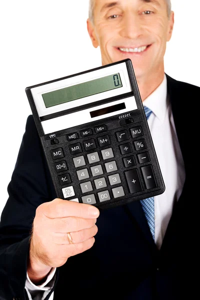 Empresário feliz segurando uma calculadora — Fotografia de Stock