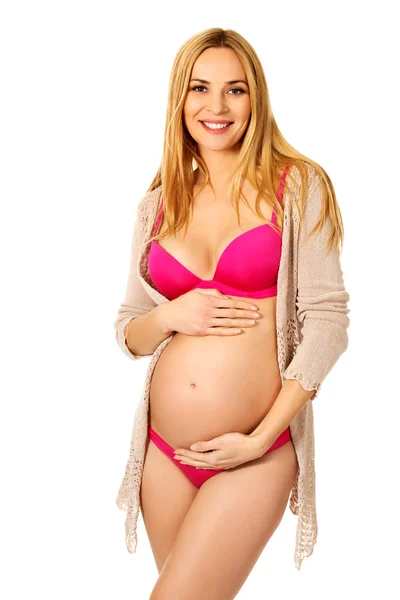 Gravid kvinna i underkläder och kofta — Stockfoto