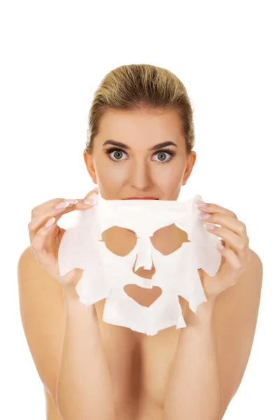 Young  woman with facial mask — Stock Photo, Image