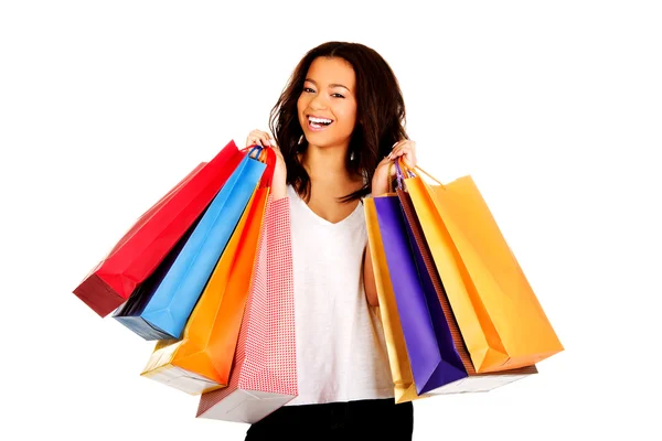 Feliz mulher sorridente com sacos de compras . — Fotografia de Stock