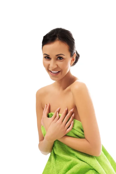 Laughing woman wrapped in towel — Stock Photo, Image