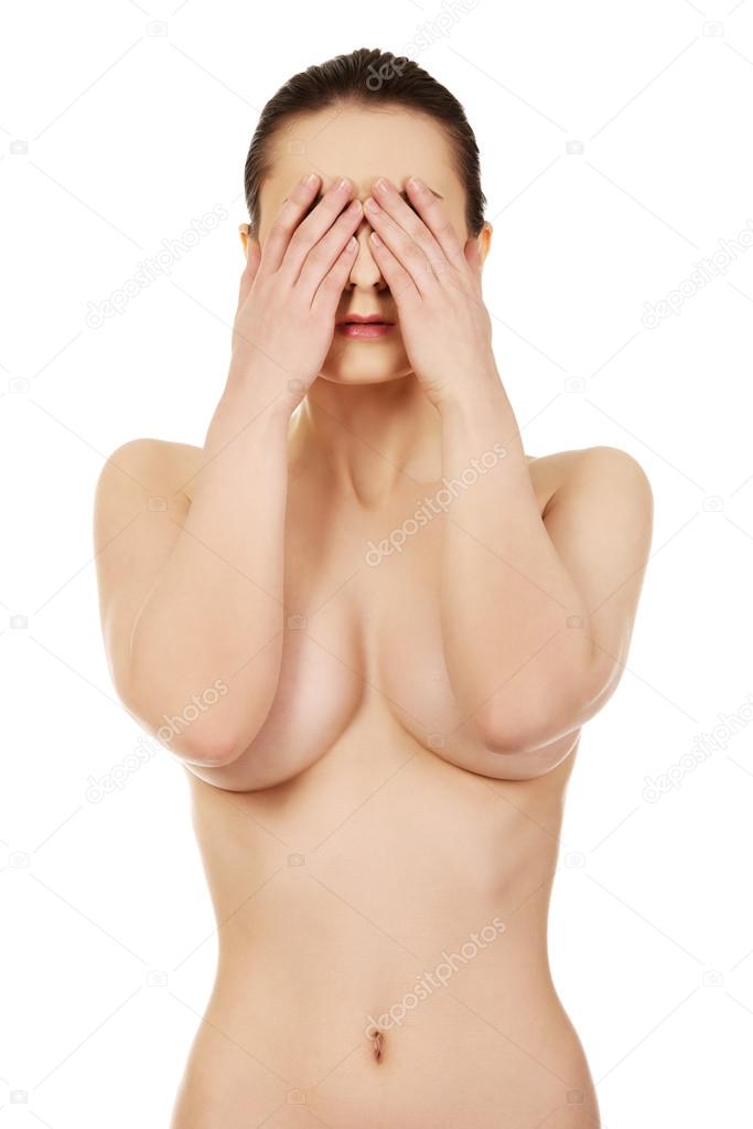 Woman covering her face.