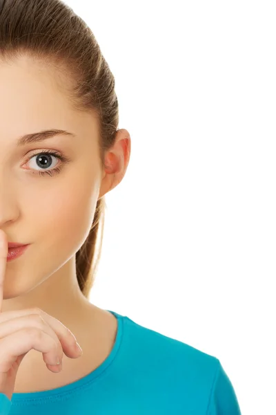 Teen woman with hush gesture. — Stock Photo, Image