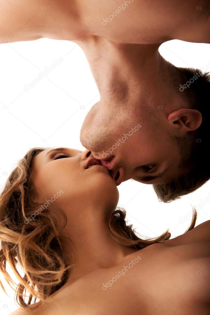 Young couple kissing.