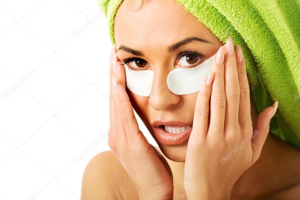 Woman with gel eye mask