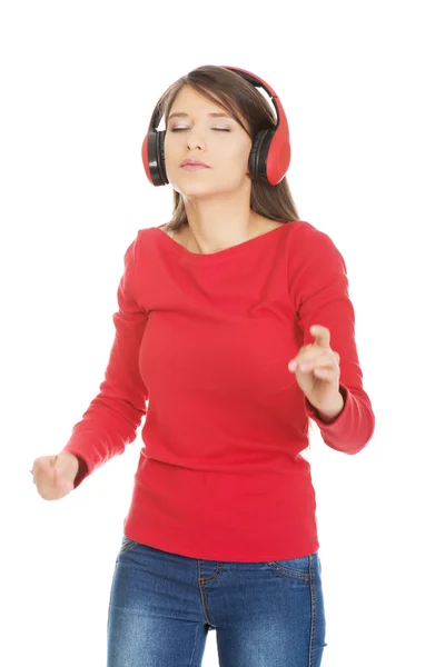 Woman with headphones listening music. — Stock Photo, Image