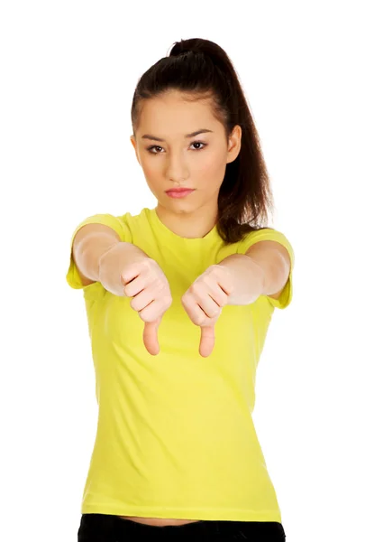 Mulher infeliz com polegares para baixo . — Fotografia de Stock