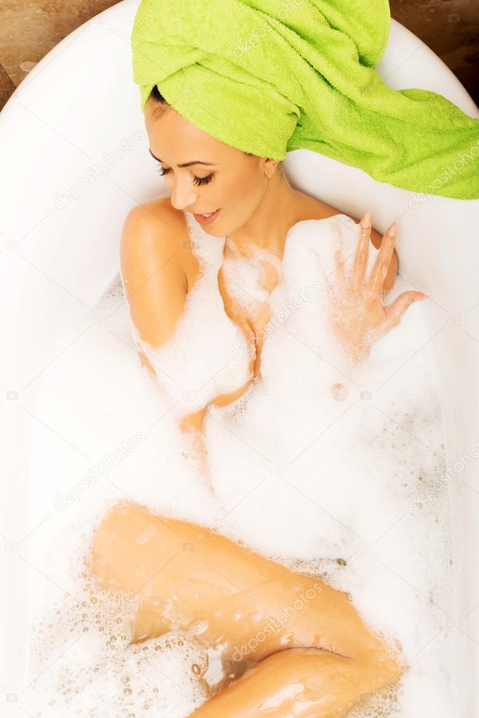Woman relaxing in bath