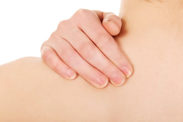 Mujer sosteniendo su cuello . — Foto de Stock