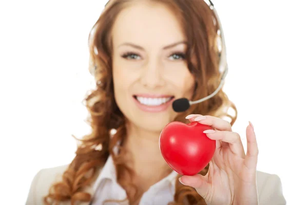 Call center donna con cuore giocattolo . — Foto Stock