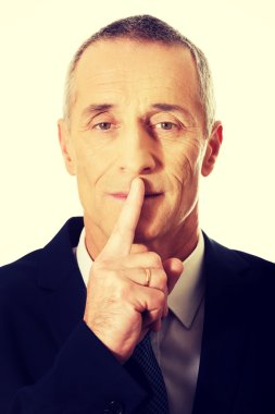 İşadamı el sessiz işareti