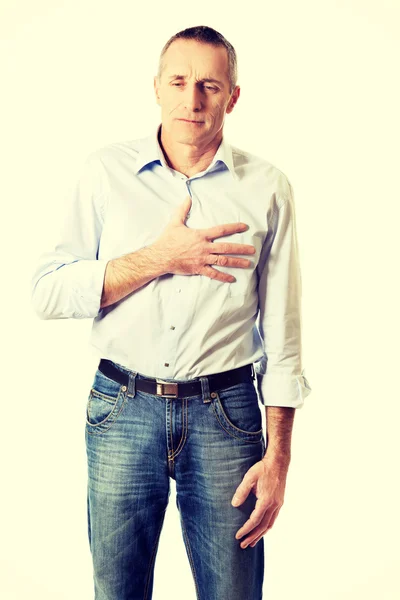 Mature man with heart disease — Stock Photo, Image