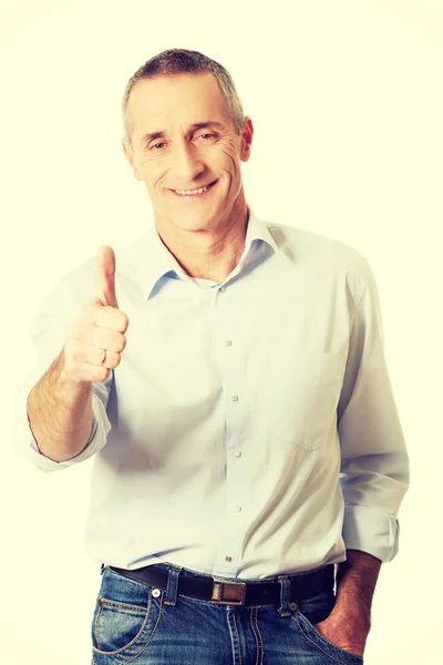 Portrait of mature man gesturing ok sign — Stock Photo, Image