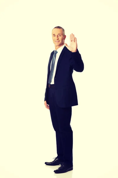 Businessman showing hand up — Stock Photo, Image