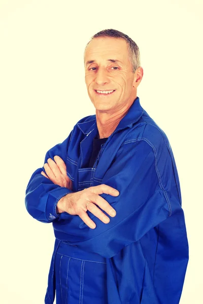 Smiling repairman with folded arms — Stock Photo, Image