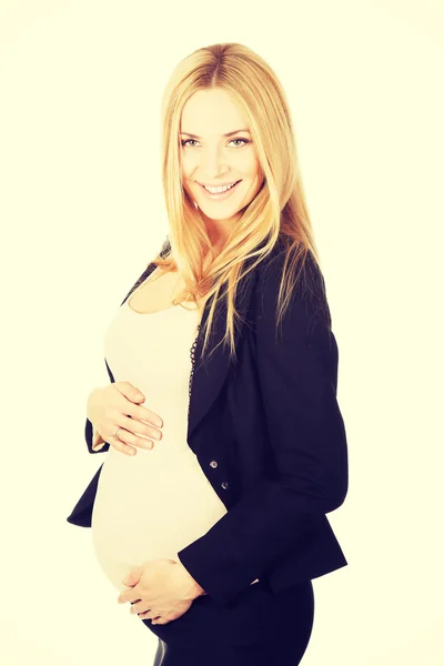 Έγκυος γυναίκα στο επαγγελματικό κοστούμι. — Φωτογραφία Αρχείου
