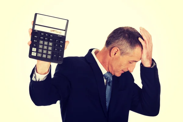 Businessman holding calculator — Stock Photo, Image