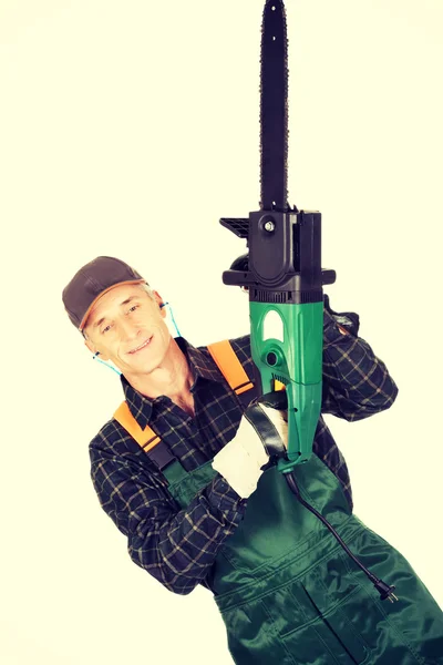 Adult sawyer with chainsaw — Stock Photo, Image