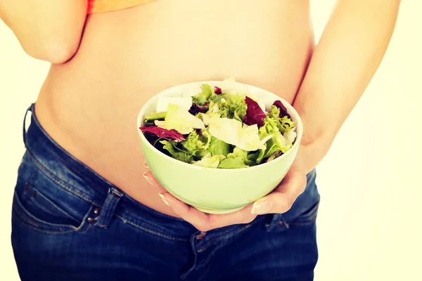 Woman holding  bowl with salad — Stock Photo, Image