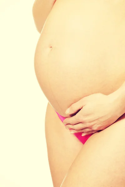 Mulher segurando barriga — Fotografia de Stock