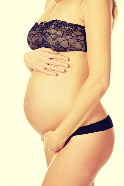 Vrouw aanraken buik — Stockfoto