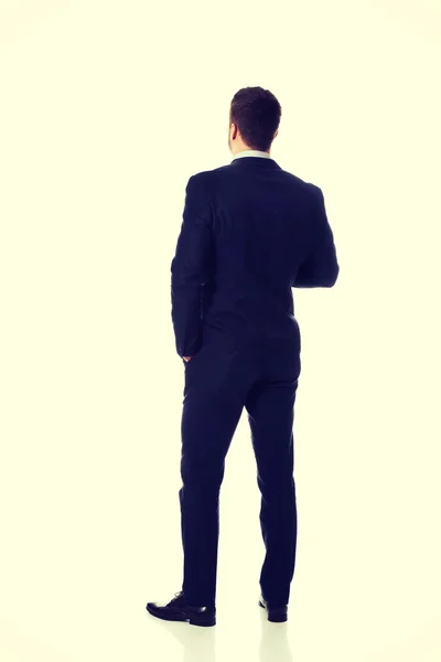 Businessman standing back to camera. — Stock Photo, Image