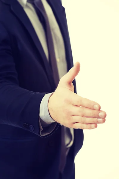 Businessman giving handshake — Stock Photo, Image