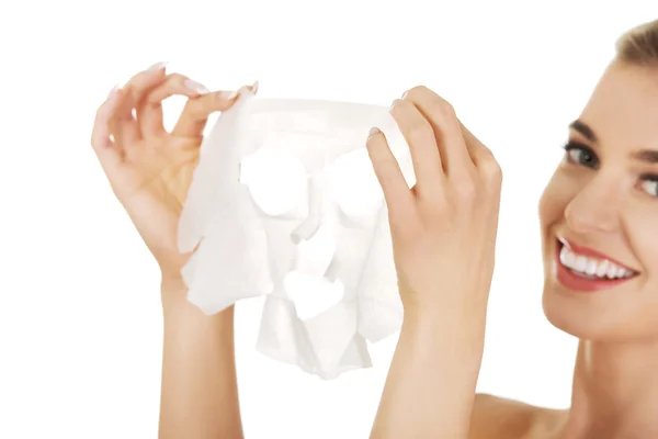 Young happy woman with facial mask — Stock Photo, Image