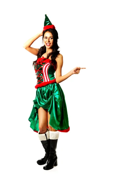 Mulher usando roupas de elfo apontando para a direita — Fotografia de Stock
