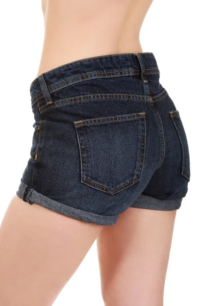 Sexy vrouw in jeans shorts. — Stockfoto