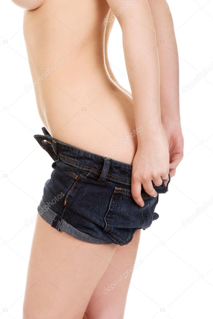 Sexy woman undressing her shorts.