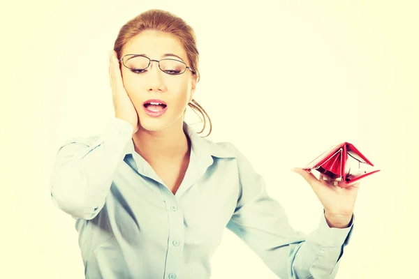 Businesswoman holding empty purse. — Stock Photo, Image