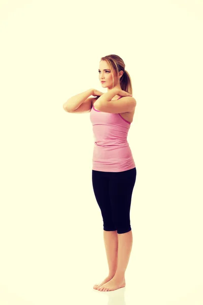 Mujer joven haciendo ejercicio aeróbico . —  Fotos de Stock