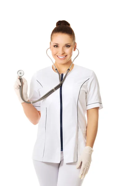 Feliz doctora con un estetoscopio — Foto de Stock