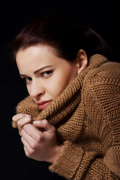 Woman wrapped in warm scarf — Stock Photo, Image