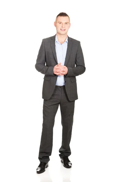 Businessman with clenched hands — Stock Photo, Image