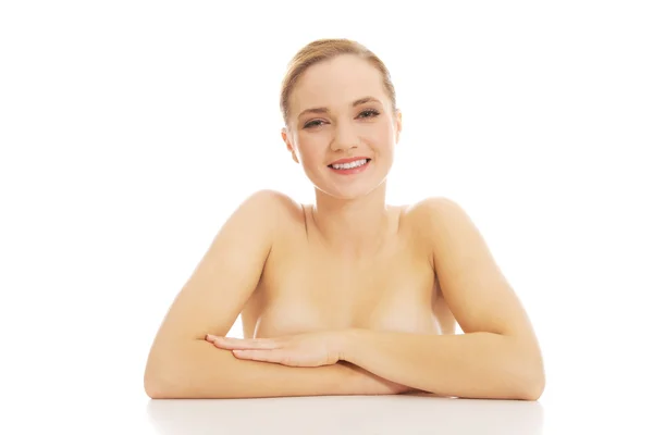 Beautiful young spa woman by a desk. — Stock Photo, Image