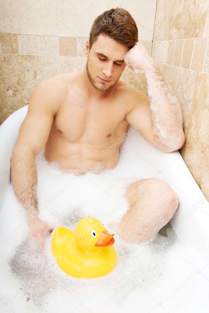 Naked men with a rubber ducky photo 992