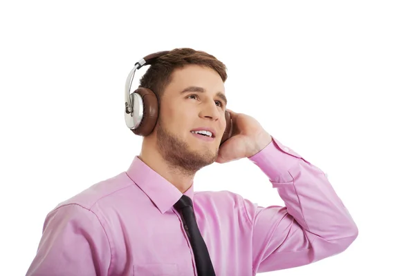 Businessman listening to music. — Stock Photo, Image