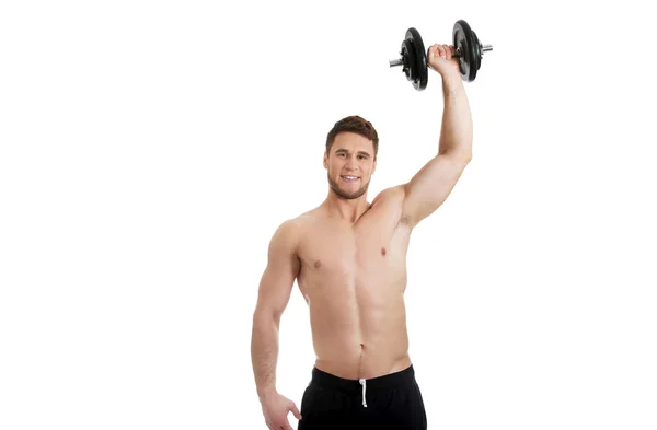 Muskulöser Sportler im Gewichtheben. — Stockfoto