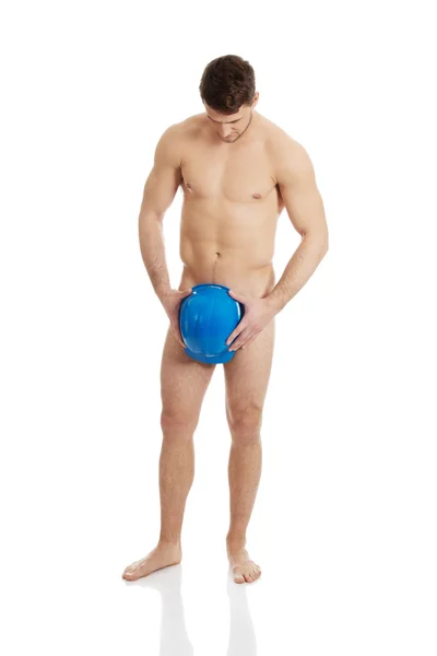 Hombre desnudo cubriéndose con casco . —  Fotos de Stock