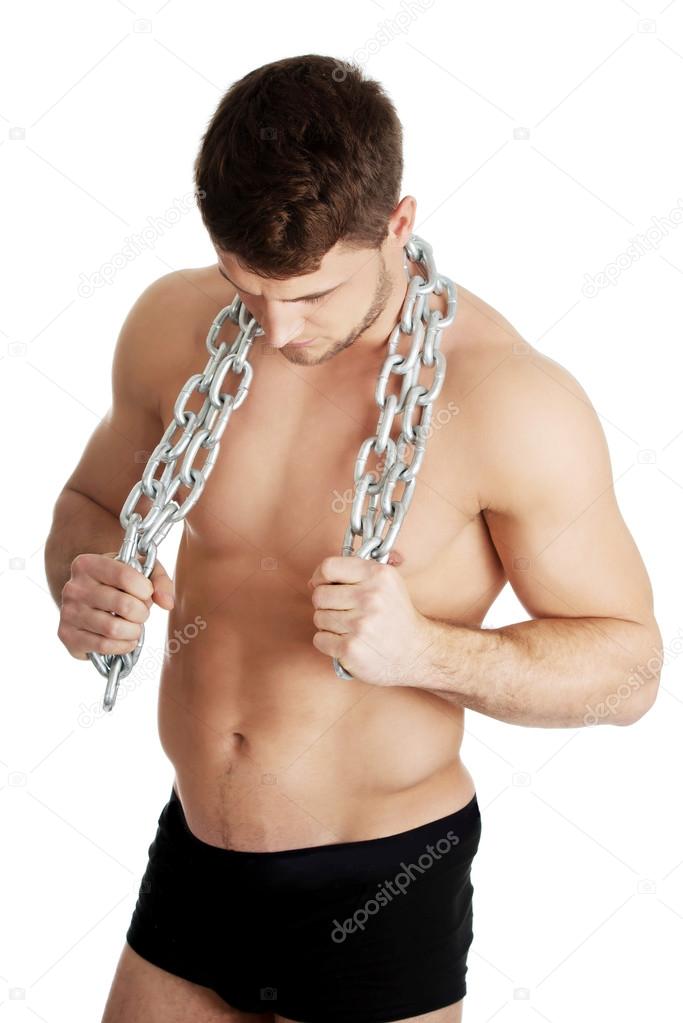 Well build model with chains over his neck.