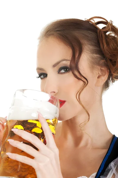 Bawarski kobieta pije piwo. — Zdjęcie stockowe