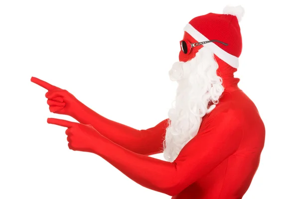 Santa man in latex clothing pointing — Stock Photo, Image