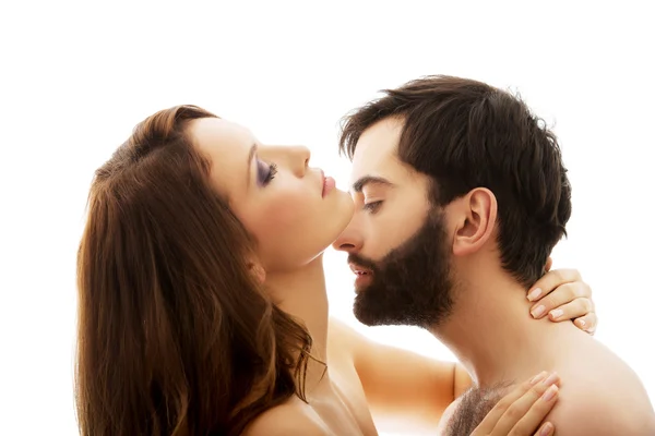 Man pretending to kiss woman's neck. — Stock Photo, Image