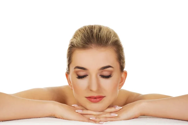 Woman lying on table — Stock Photo, Image