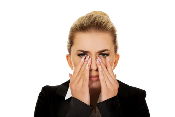 Businesswoman having nose ache — Stock Photo, Image