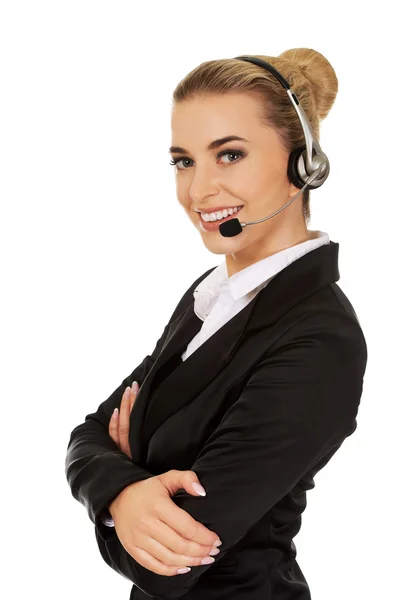 Jeune femme d'affaires avec casque — Photo